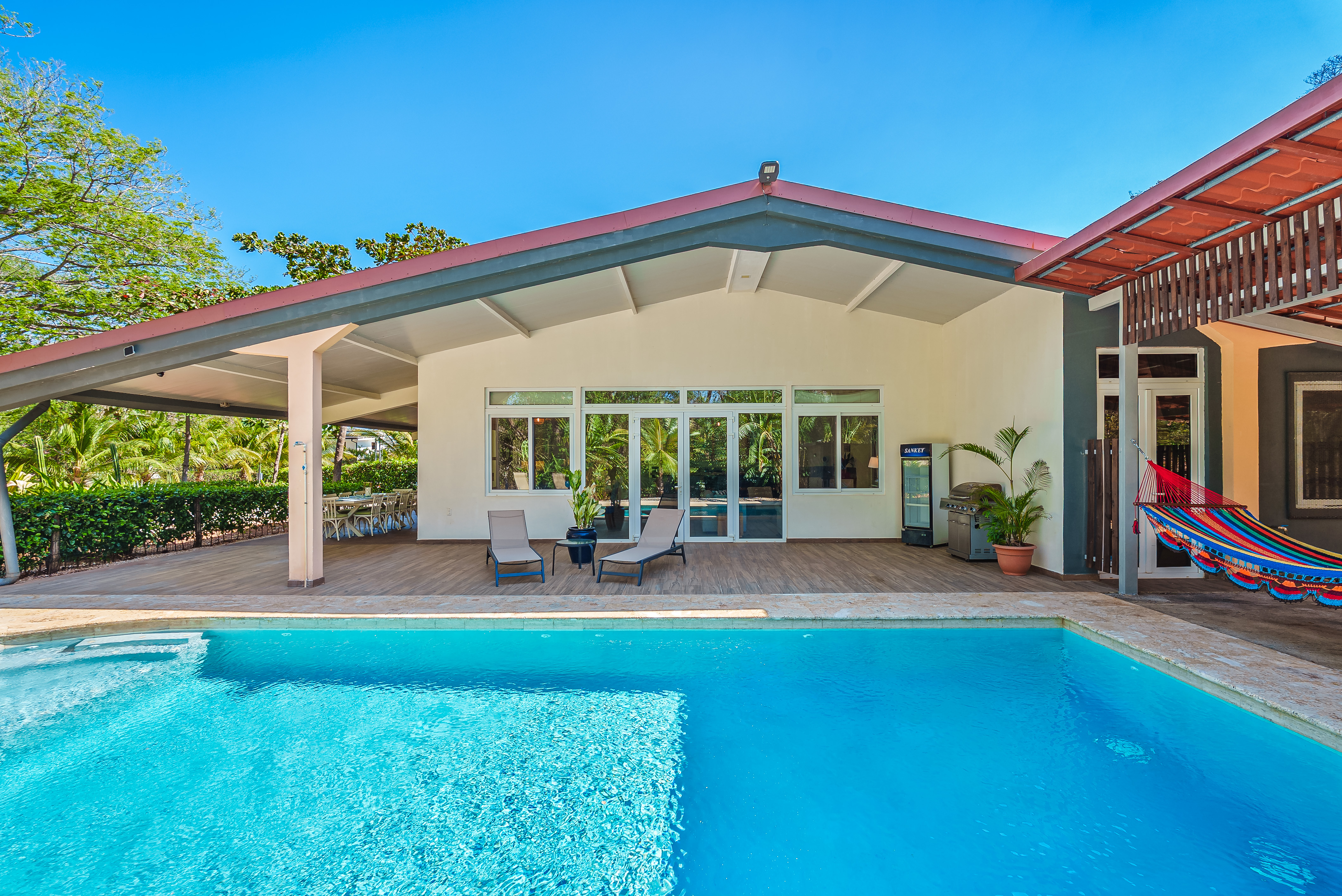Casa Sunshine pool deck with hammock